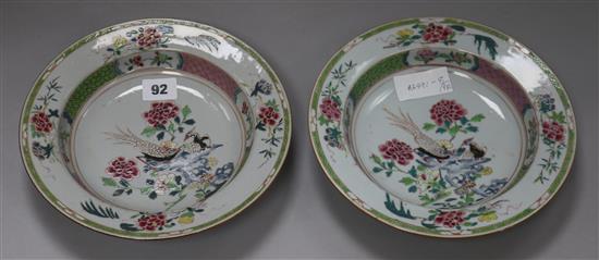 A pair of Chinese export famille rose pheasant plates diameter 23cm